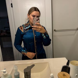 Kyla added a photo of their purchase