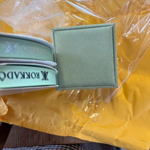 Helena added a photo of their purchase