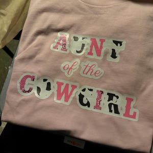 Caitlin added a photo of their purchase