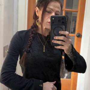 Pamela added a photo of their purchase