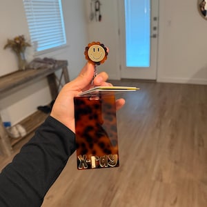 Noemi added a photo of their purchase