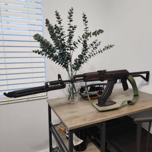 Enmanuel added a photo of their purchase