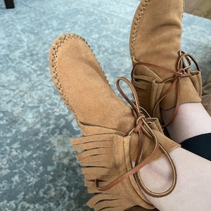 Laura added a photo of their purchase
