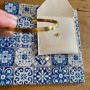 Véronique added a photo of their purchase