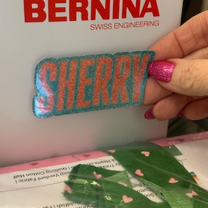 Sher added a photo of their purchase