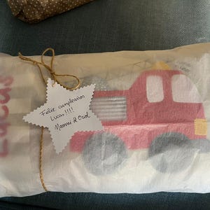 Naomi added a photo of their purchase