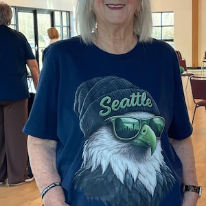 Sheila added a photo of their purchase