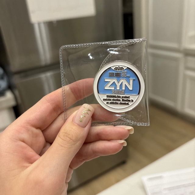 Did you guys know that zyn cans have a used pouch slot? I can't believe how  many cans it took for me to find this. : r/NicotinePouch