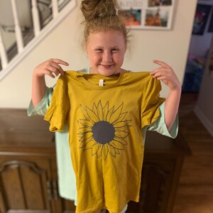 Katie added a photo of their purchase