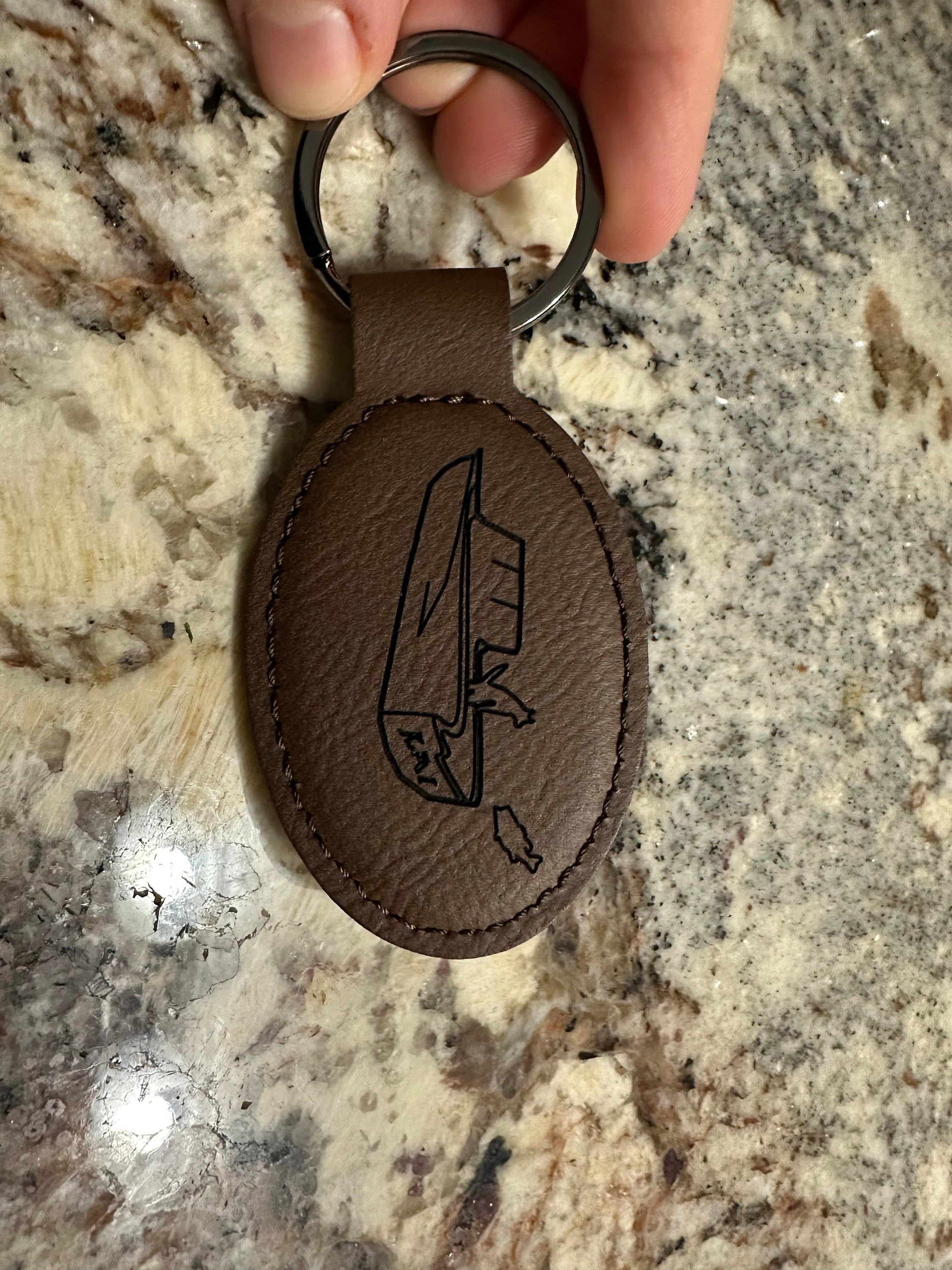 Customer photo of Custom Logo Engraved / Etched Leatherette Keychain from Marzia