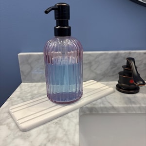 Kimberly added a photo of their purchase