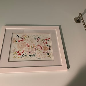 Sarah added a photo of their purchase