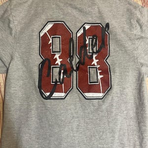 Kayla added a photo of their purchase