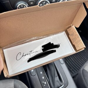 Christina added a photo of their purchase