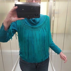 Elke added a photo of their purchase