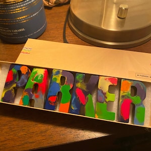 Alexandra added a photo of their purchase