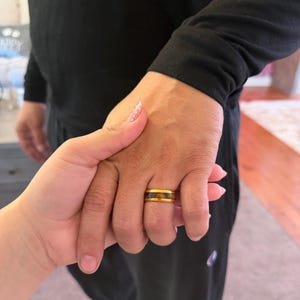 Aileen added a photo of their purchase
