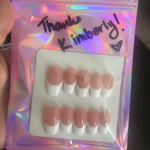 Kimberly added a photo of their purchase