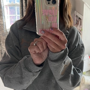 Caitlin added a photo of their purchase