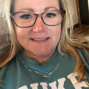 Holly added a photo of their purchase