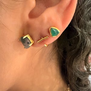 Customer photo from Sheila, Dainty Raw Emerald Stud Earrings in Yellow Gold