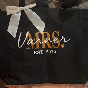 Alexandra added a photo of their purchase