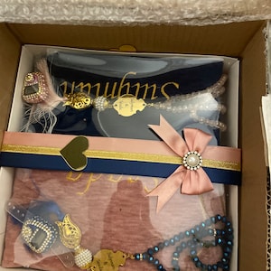 Aziza added a photo of their purchase