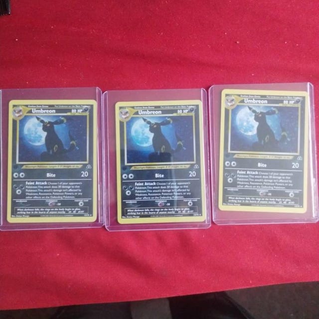 first umbreon pokemon card 2001 Pokemon Neo Discovery Umbreon 1st Edition PSA 9 main image 1