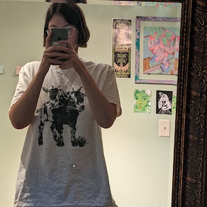 Masha added a photo of their purchase