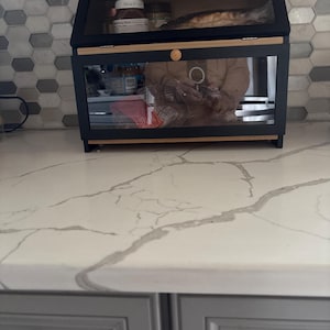 Catherine added a photo of their purchase