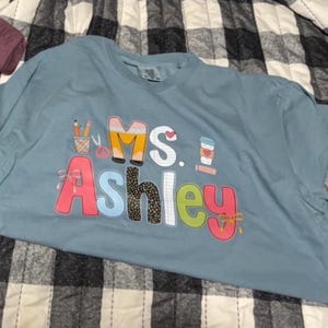 Ashley added a photo of their purchase