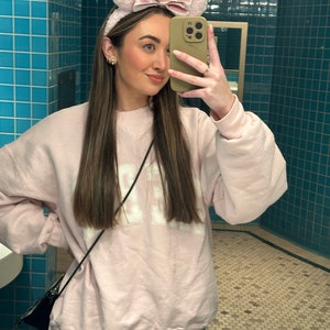 Catie added a photo of their purchase