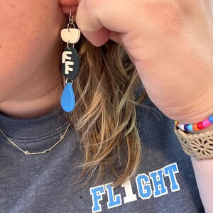 Katie added a photo of their purchase