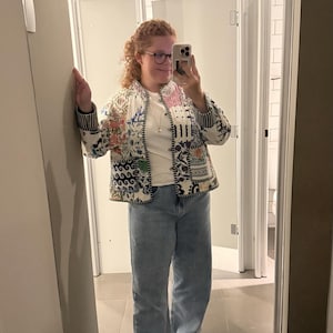 Luiza added a photo of their purchase