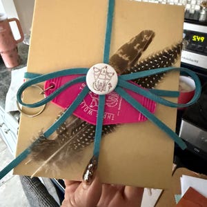 Cassie added a photo of their purchase