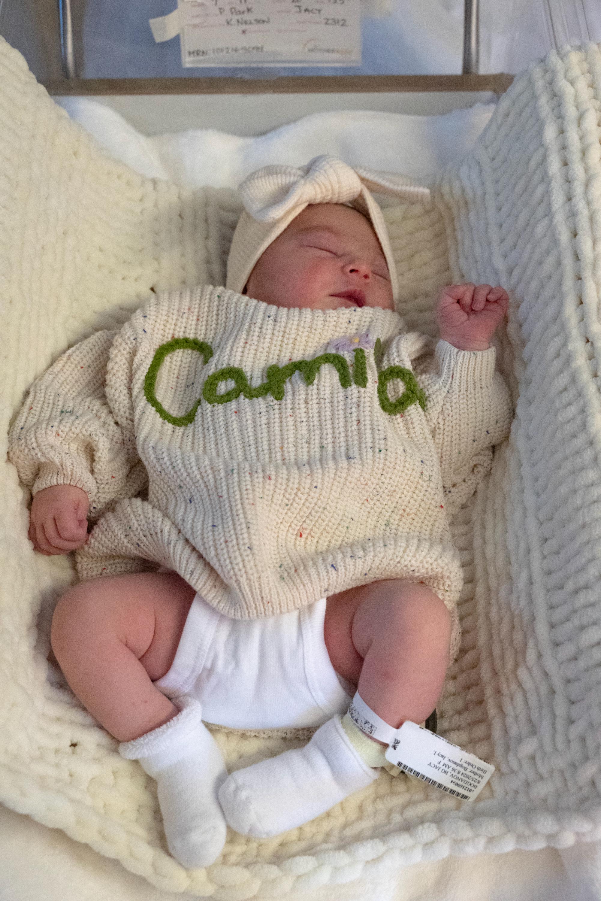 Cherished Custom Baby Sweaters: Personalize Their Name with Exquisite Embroidery