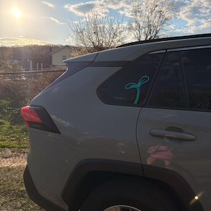 Emily added a photo of their purchase