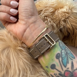 Mona added a photo of their purchase