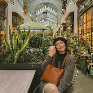 Xitlaly added a photo of their purchase