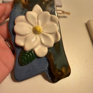 Laura added a photo of their purchase