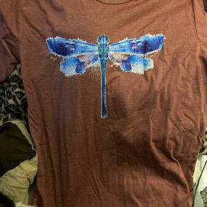 Katie added a photo of their purchase
