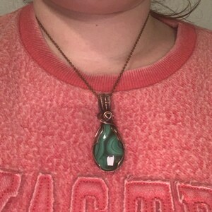 SARAH added a photo of their purchase