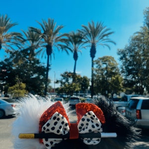 Cruella Disney ears.