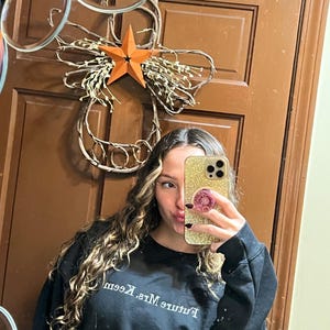Erica added a photo of their purchase