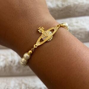 Vivienne Westwood Gold Mini Orb Pearl Bracelet - Etsy