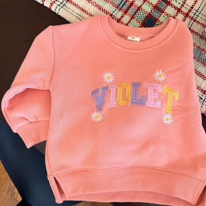 Courtney added a photo of their purchase