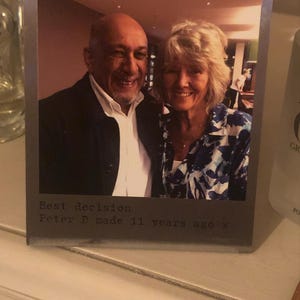 Sharon added a photo of their purchase