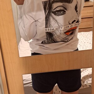 Alisha added a photo of their purchase