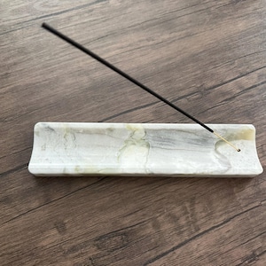 Roxanne added a photo of their purchase
