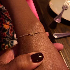 Customer photo, Tennis Racquet Charm Bracelet